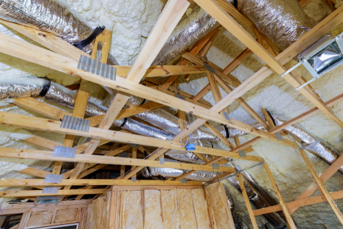 Installing,Attic,Insulation,Material,Is,Sprayed,With,Liquid,Foam,Of
