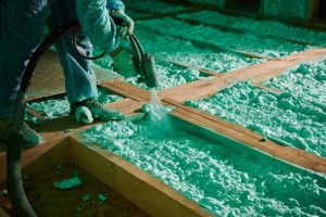 Male,Builder,Insulating,Wooden,Frame,House.,Cropped,View,Of,Man - Ottawa insulation rebates