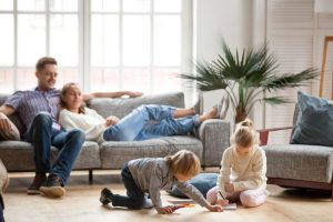 Family enjoying cozy warm insulated home Energy Efficiency